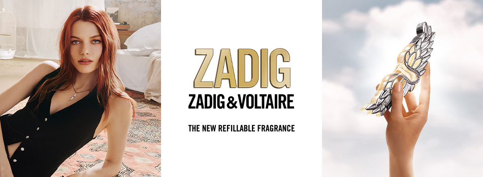 Werbung für das neue nachfüllbare Parfum von Zadig & Voltaire. Links eine Frau mit roten Haaren in schwarzer Kleidung, die auf einem Bett liegt. In der Mitte das Logo 'ZADIG & VOLTAIRE' mit der Aufschrift 'The New Refillable Fragrance'. Rechts eine Hand, die einen kunstvoll gestalteten Parfumflakon mit Flügel-Design gegen den Himmel hält.